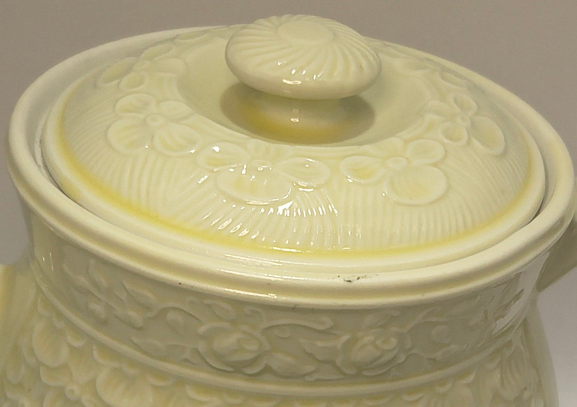 Vintage Floral Ceramic Teapot – Embossed Off-White Pottery with Orange Floral Detail