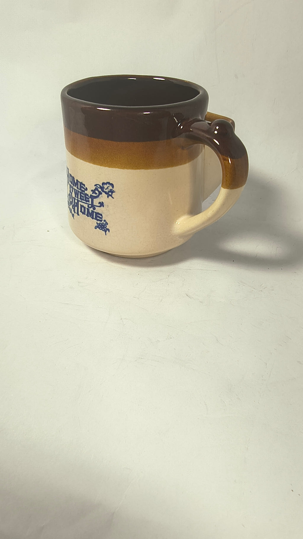 Vintage "Home Sweet Home" Stoneware Coffee Mug | Rustic Brown Glaze Pottery Cup with Blue Floral Stencil | Thumb Rest Handle