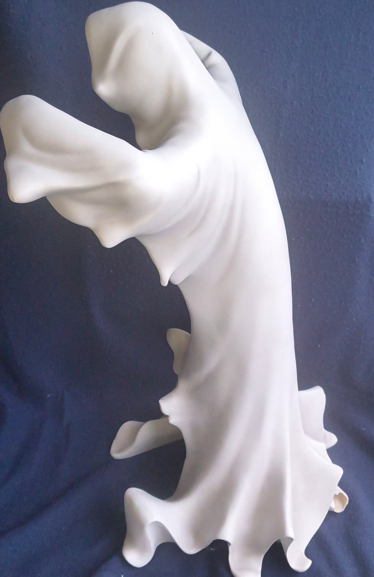 Ghost sculpture back view showing minor damage